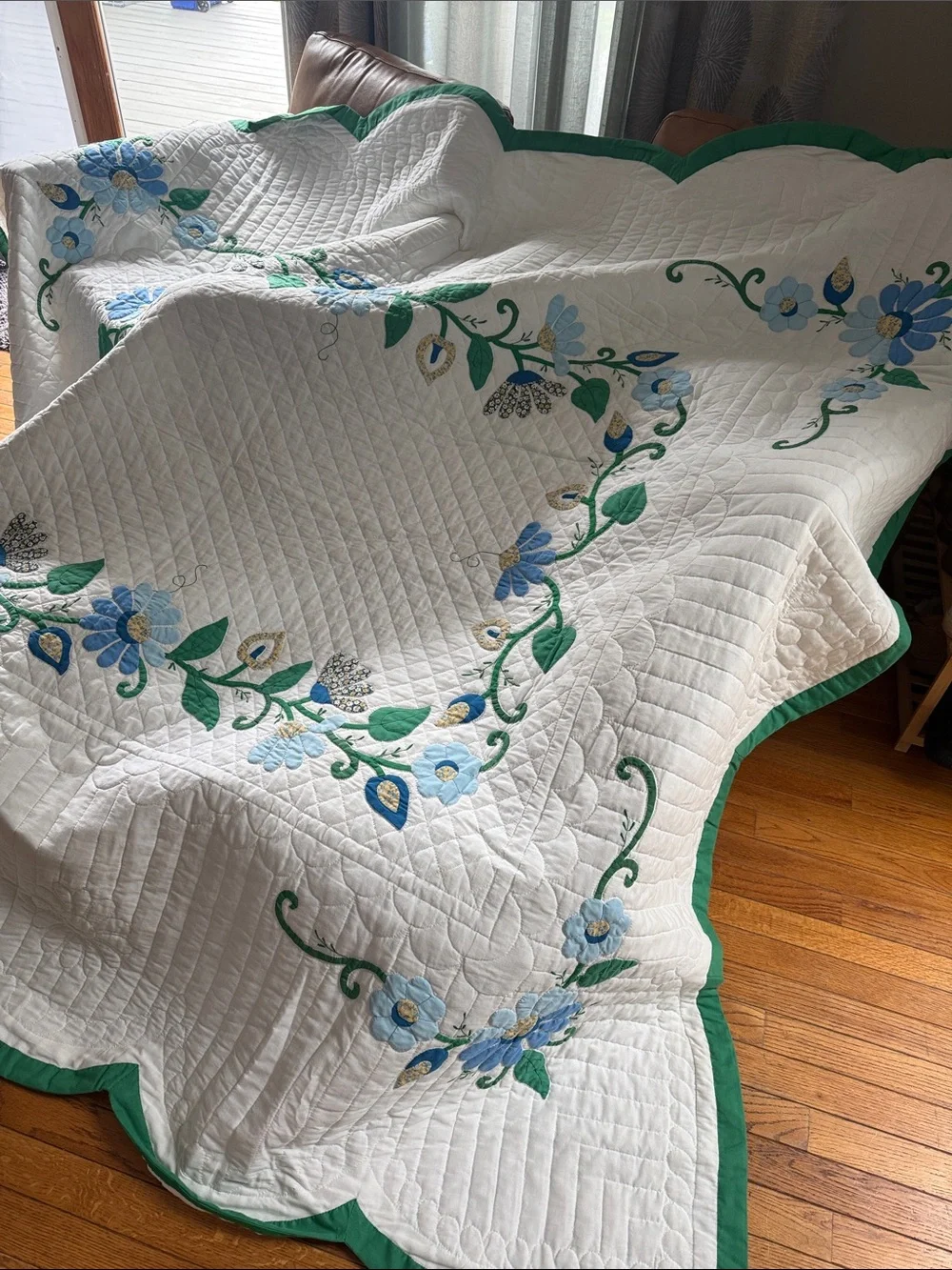 White Quilted Floral Bedspread with Blue and Green Accents